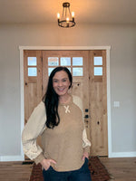 Reglan Sleeve Top With Floral Detail.
